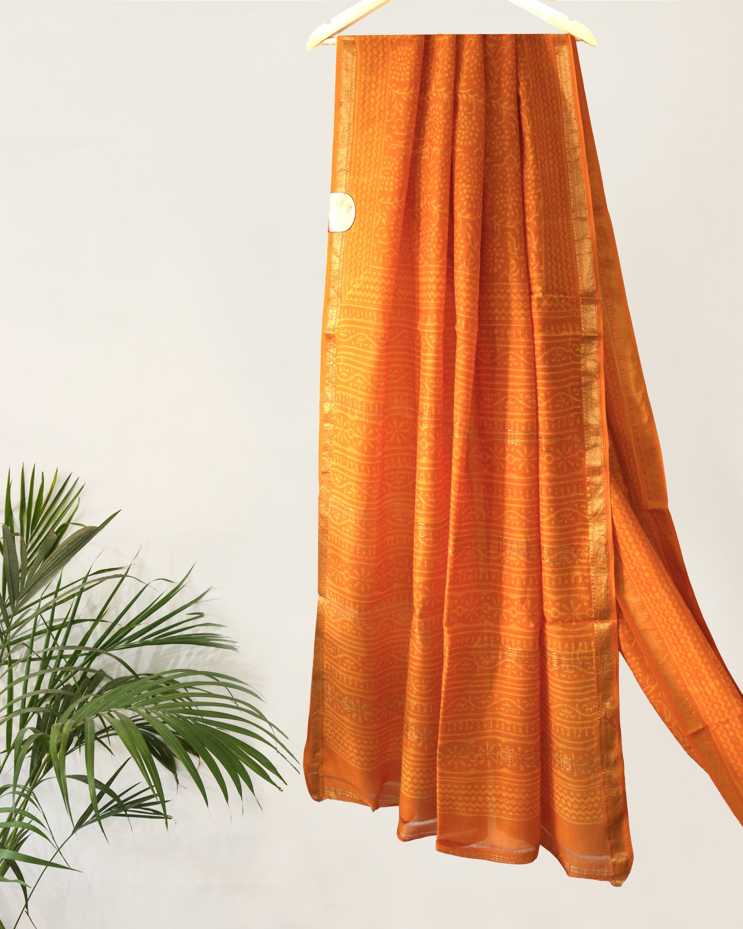 Orange Dabu Print Maheshwari Saree