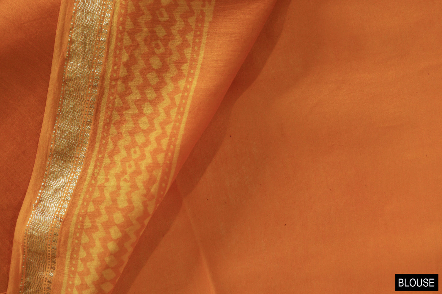 Orange Dabu Print Maheshwari Saree