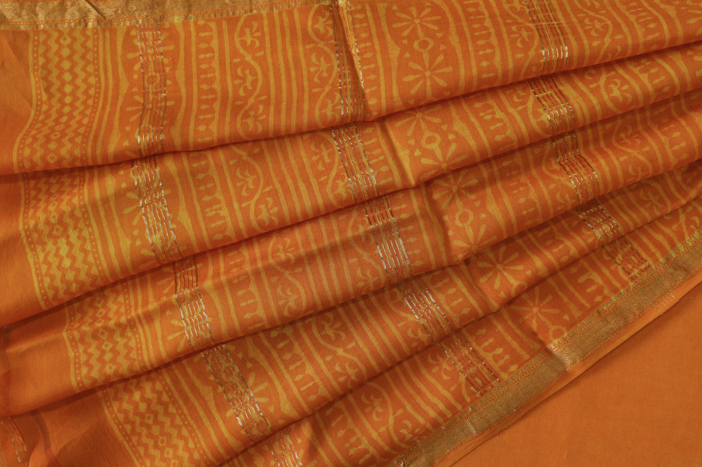 Orange Dabu Print Maheshwari Saree